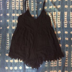 Black romper with lace trim